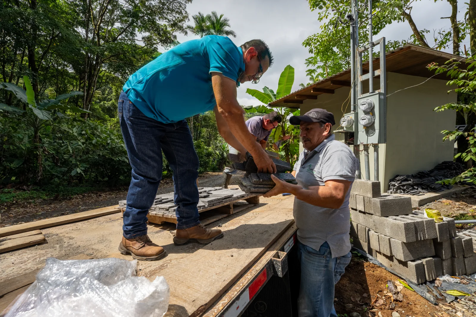 Craftspeople working on the Casa Cielo construction project